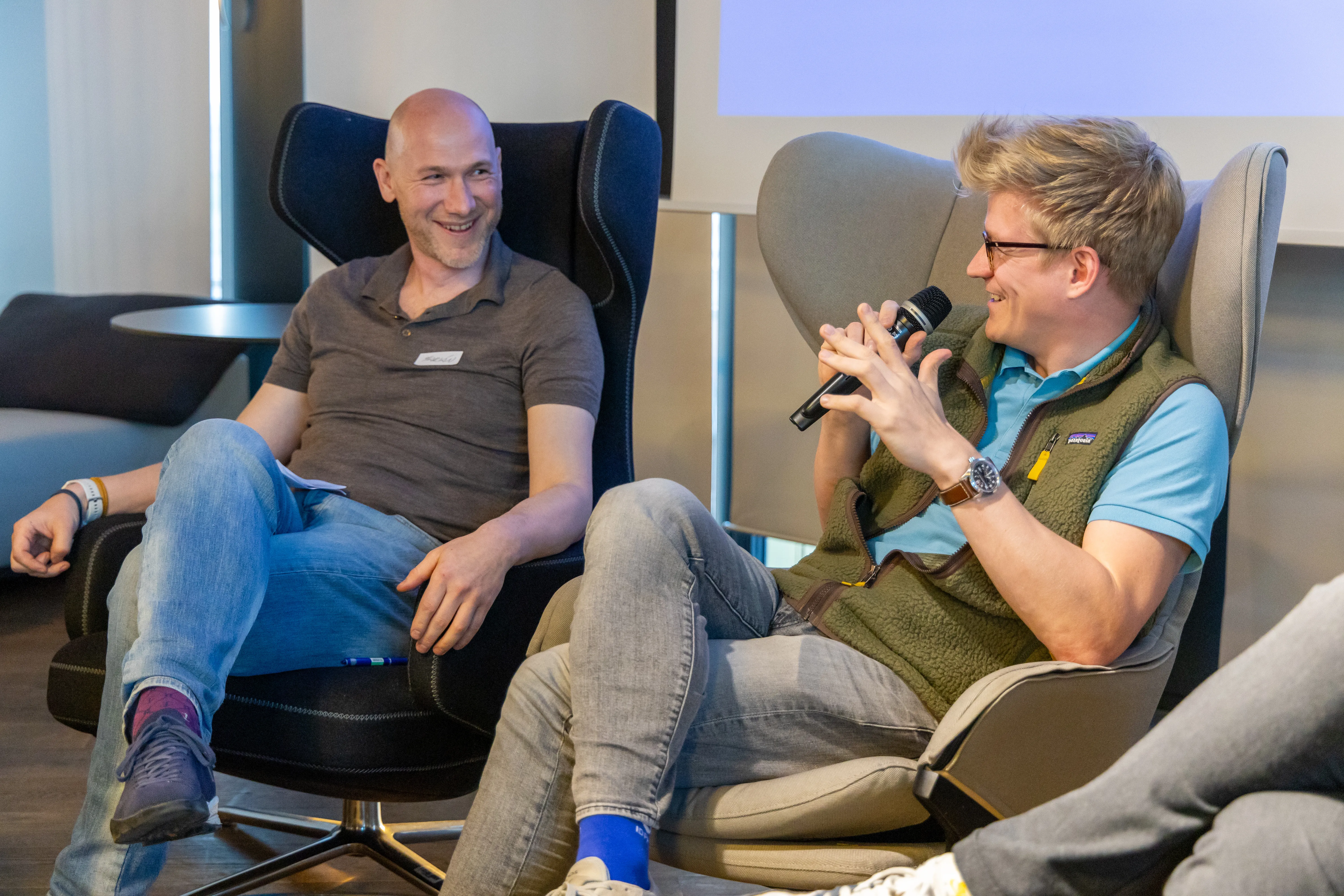 Two speakers in a fireside discussion at an ELC meetup