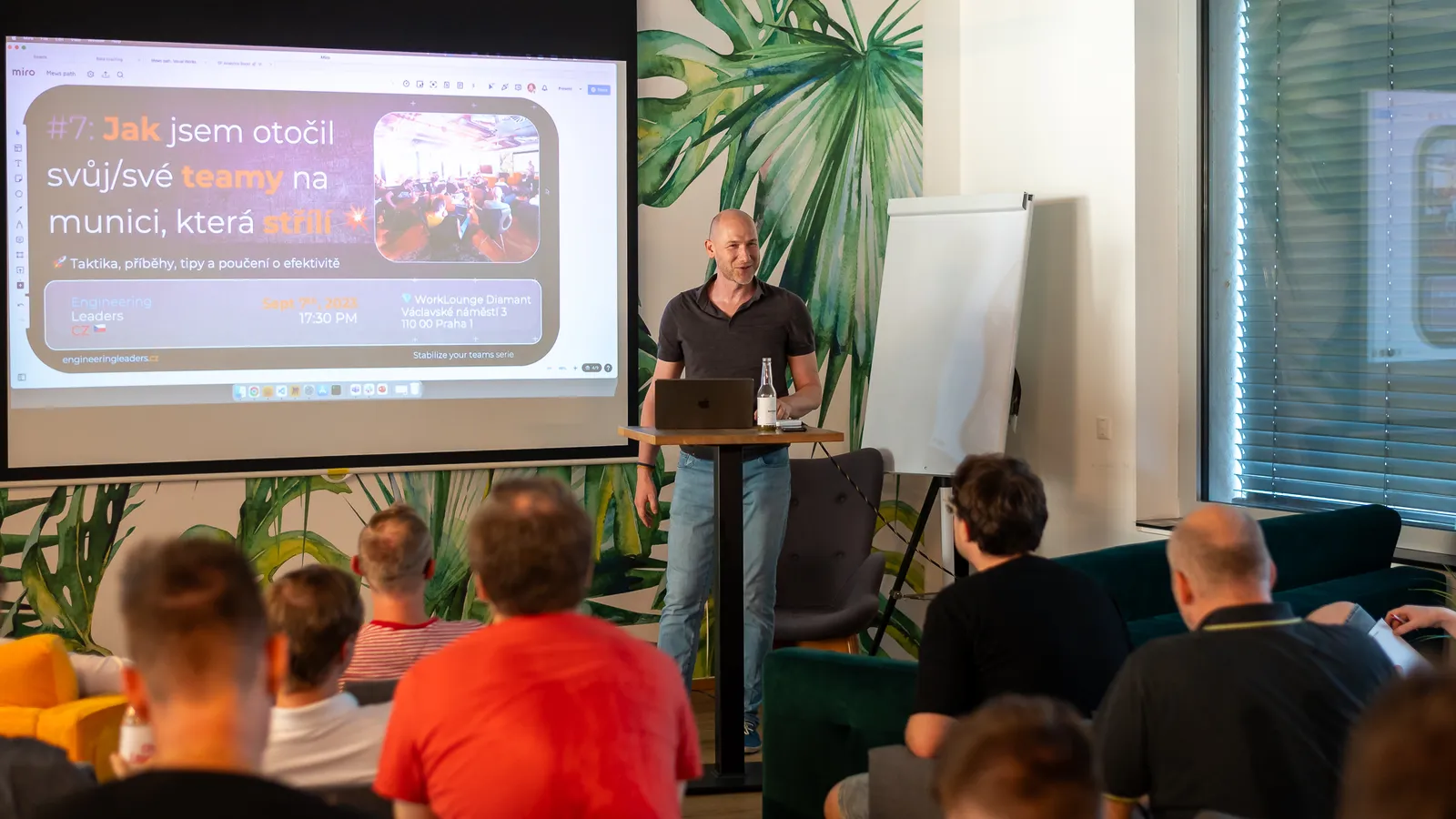 Speaker at the lectern during an ELC meetup
